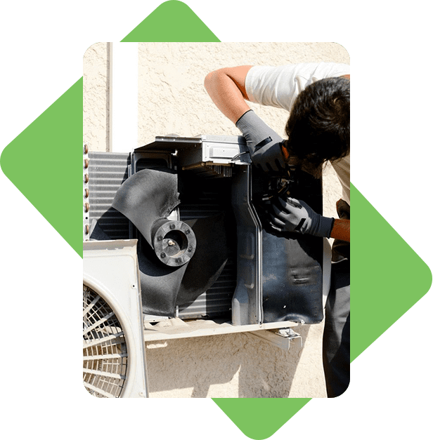 A man is working on something outside